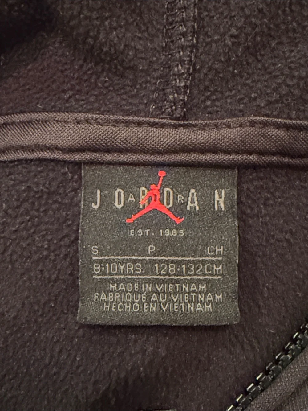 Jordan Boys Black Zip Up Hoodie with Red Sleeve Design Size S